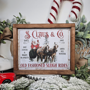 Cadre décoratif farmhouse S. Claus & Co Sleigh Rides en bois, style vintage Noël avec Père Noël en traîneau et chevaux