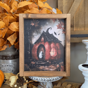 Cadre farmhouse Halloween avec maison citrouille et petit fantôme