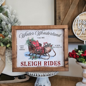 cadre décoration Noël farmhouse avec traîneau, plaid rouge et texte Winter Wonderland Sleigh Rides