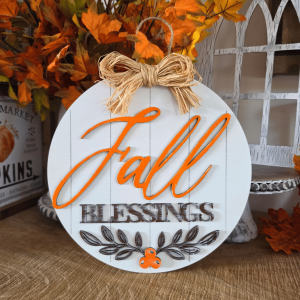 Sign farmhouse Fall Blessings rond blanc et orange avec feuillages et nœud en raphia