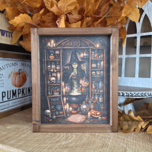Cadre sorcière farmhouse avec chaudron, potions et chat noir
