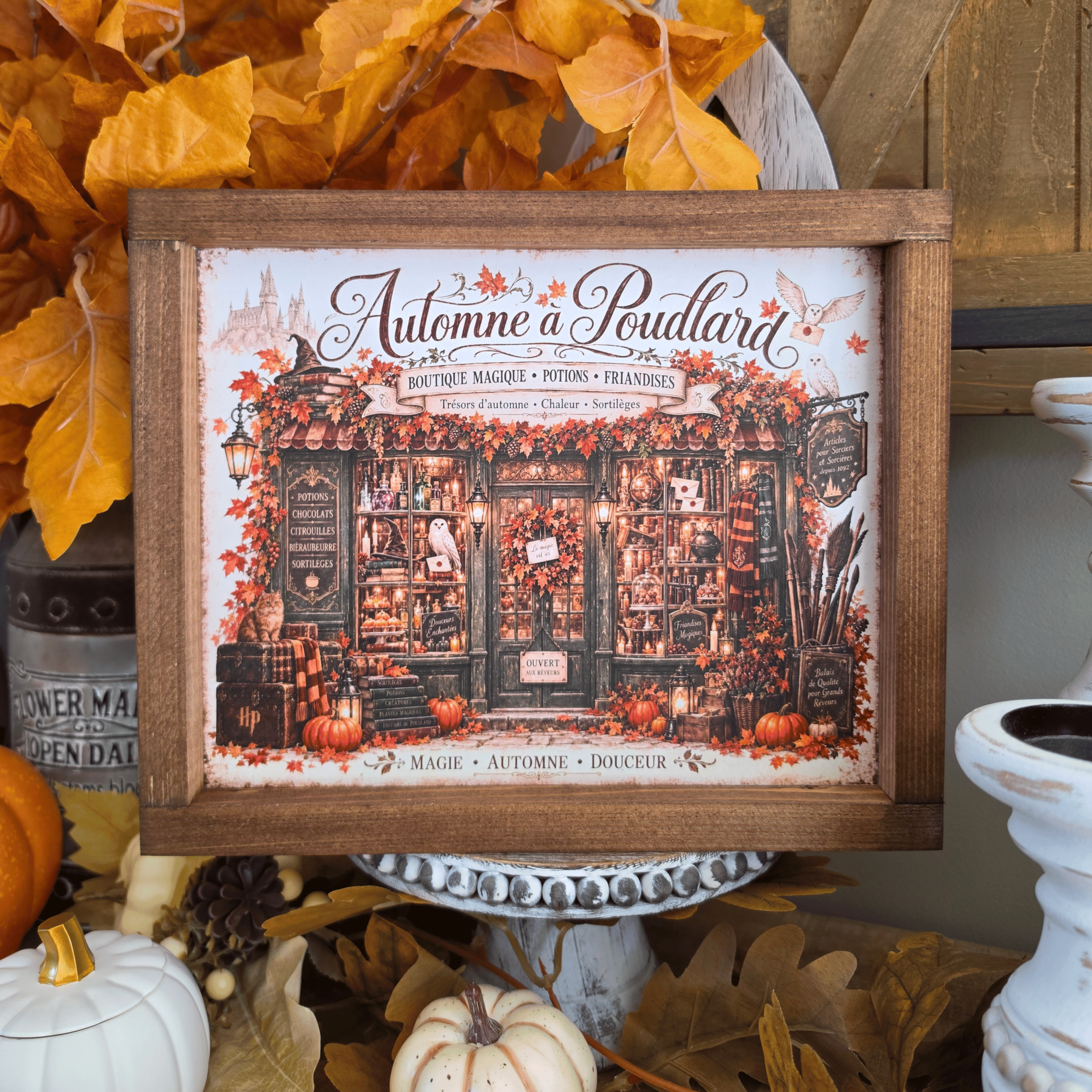 Cadre Automne à Poudlard avec boutique magique et citrouilles