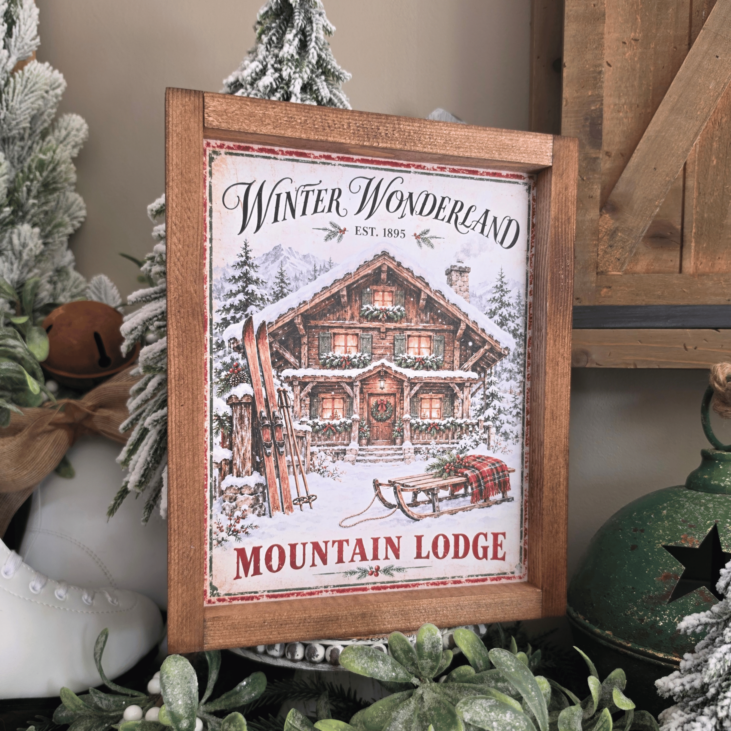 Cadre farmhouse Winter Wonderland avec chalet enneigé, skis et luge