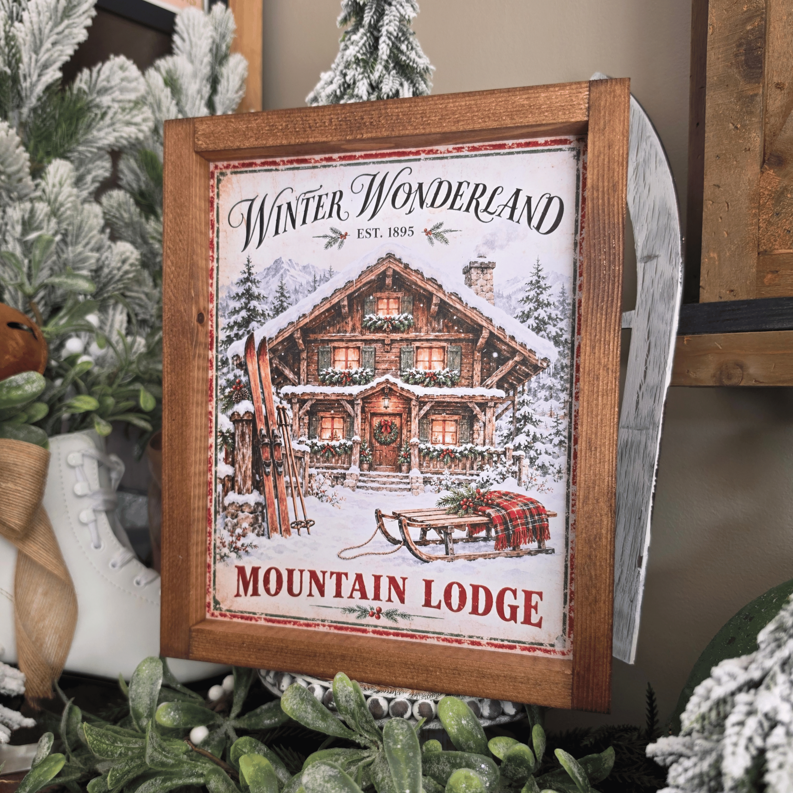 Cadre farmhouse Winter Wonderland avec chalet enneigé, skis et luge