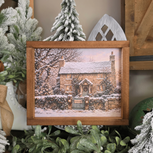 Cadre Rosehill Cottage avec maison en pierre et jardin enneigé